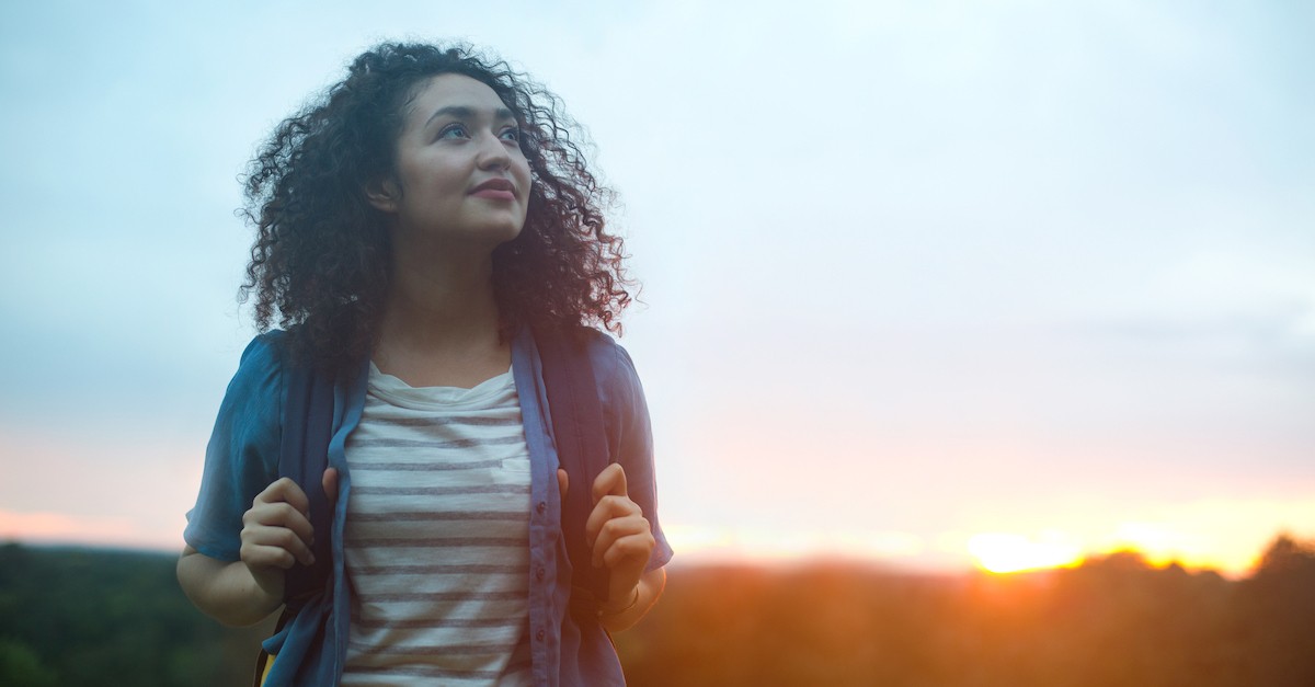 woman outside hiking; what is worship?